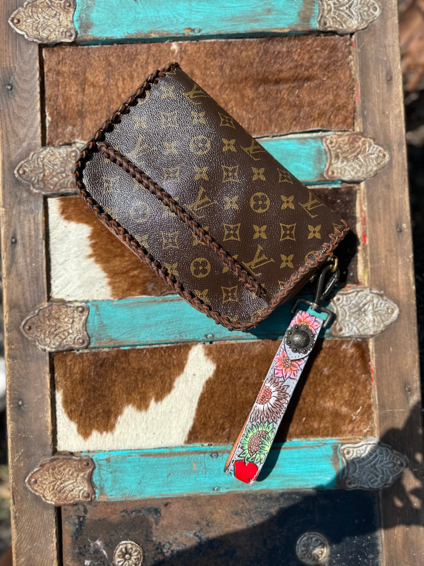 Out on the town clutch with tooled strap!